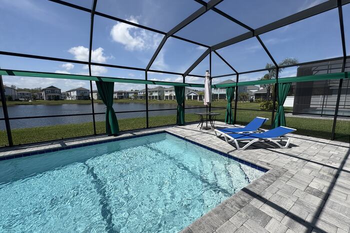 Lakefront screened pool near the Pineda Causeway in Melbourne, FL